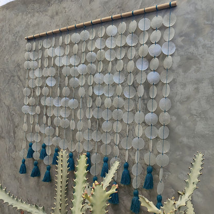 Capiz wall hanging with blue cotton tassel for Boho Interior Decor
