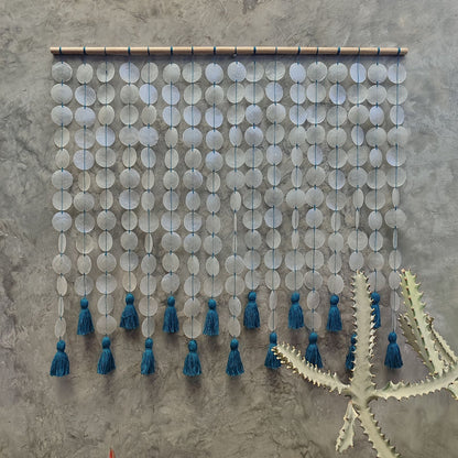 Capiz wall hanging with blue cotton tassel for Boho Interior Decor