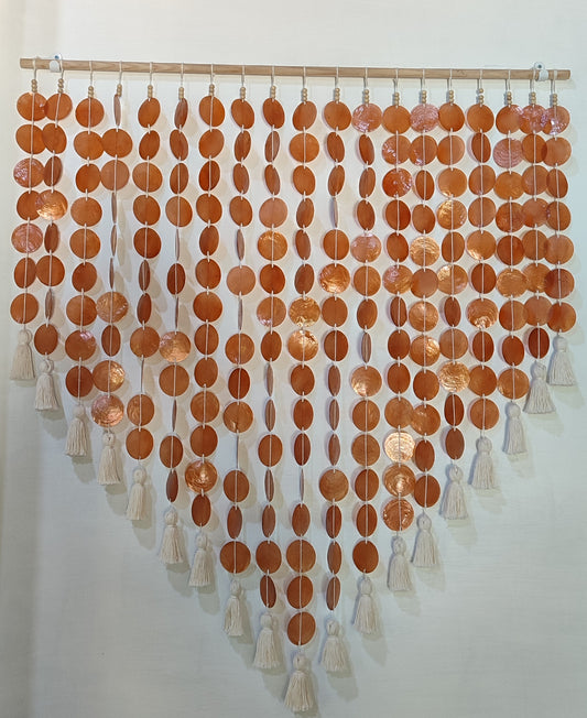 Orange capiz shell wall decor
