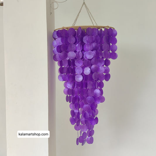 Purple capiz shell chandelier with a chain on a white background