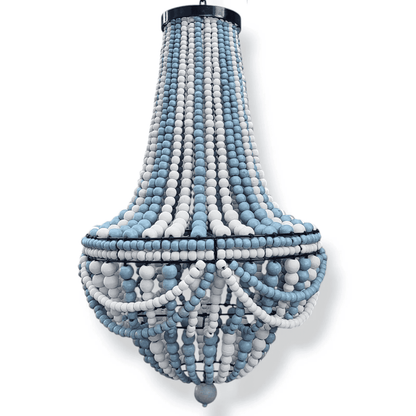 Decorative chandelier with blue and white wood beads on a white background